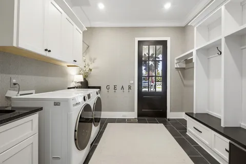 a bathroom with a tub and shower
