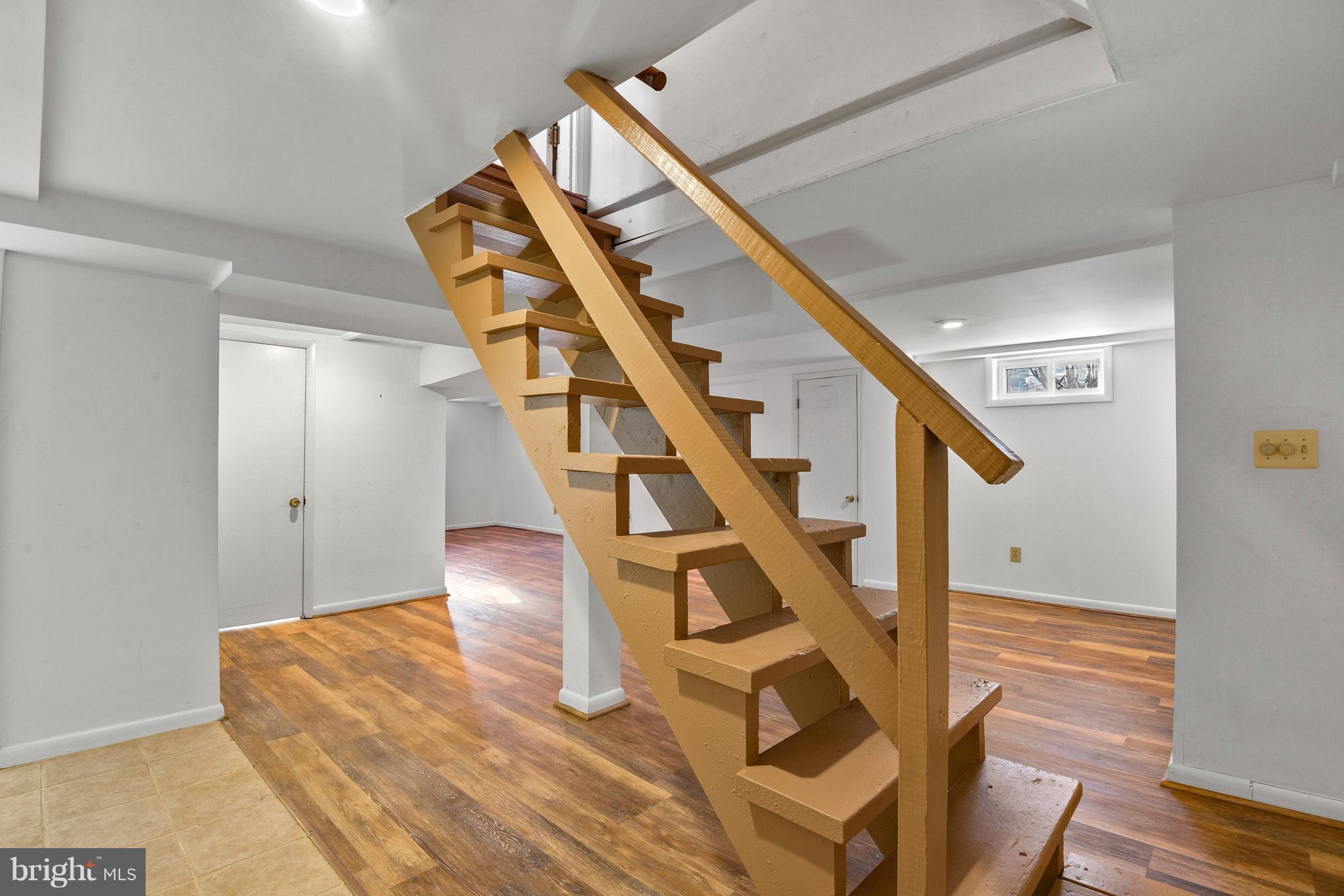 9411 Warren Street Silver Spring, MD 20910 - Photo 43 of 55 VIEW FROM STAIRS TOWARD BACK OF ROOM