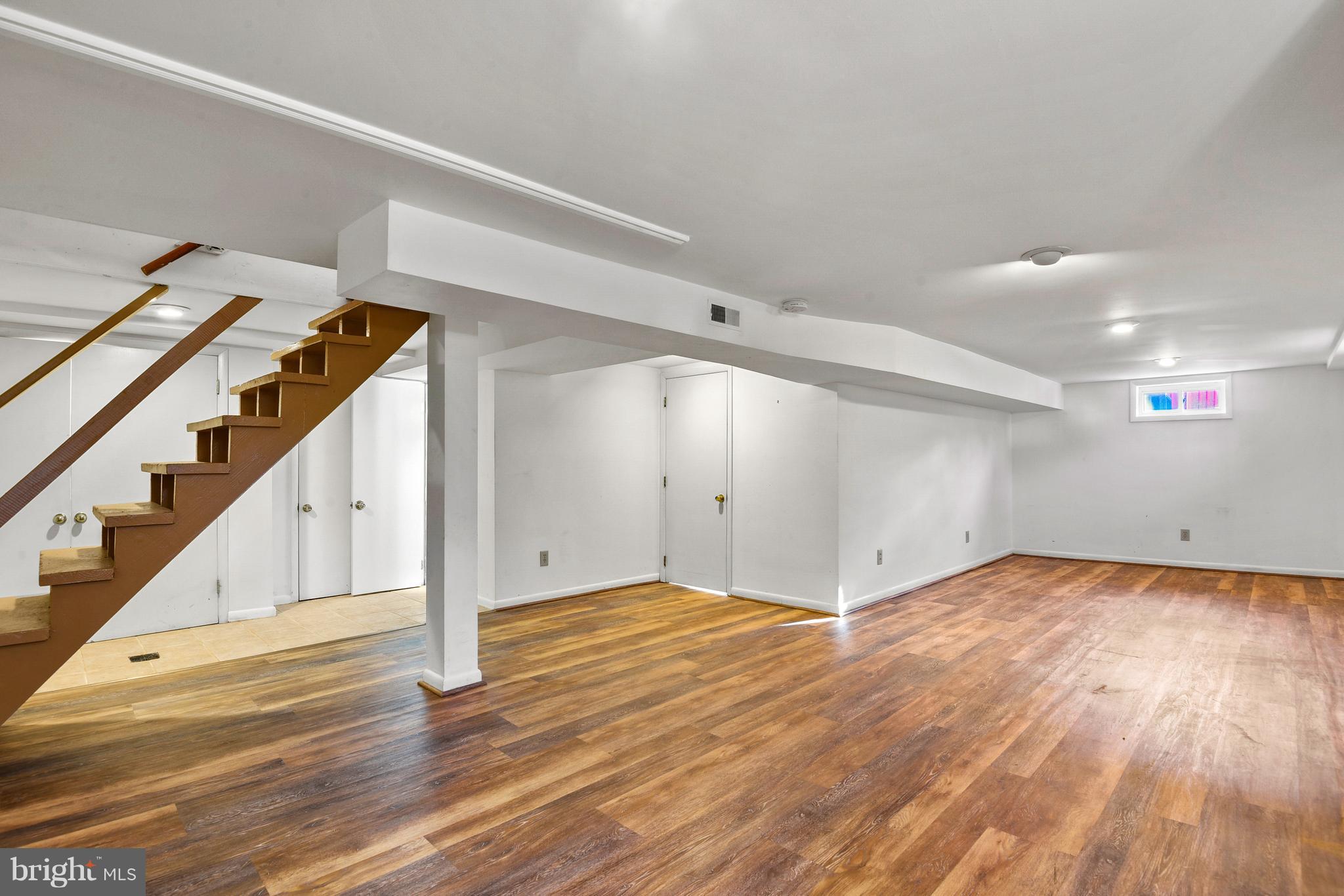 9411 Warren Street Silver Spring, MD 20910 - Photo 45 of 55 VIEW OF REC ROOM TOWARD BATHROOM