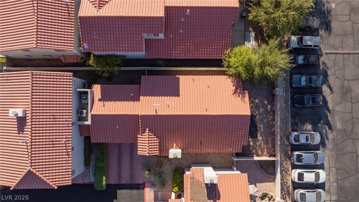 2254 Ramsgate Drive Henderson, NV 89074 - Photo 38 of 43 An aerial perspective reveals the neighborhood's uniform tile roofs and convenient parking.