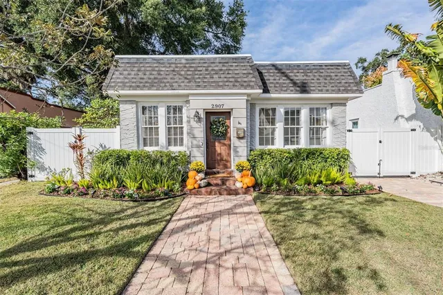 front view of a house with a patio