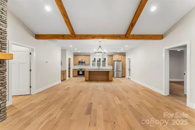 a view of a kitchen with a sink and a kitchen