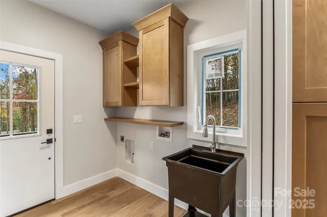 a kitchen with granite countertop a stove and a sink