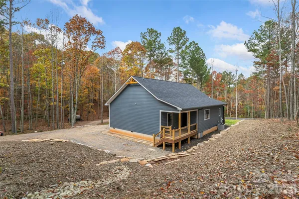 a house with trees in the background