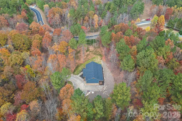 an aerial view of residential house with outdoor space