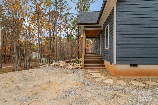 a view of a backyard of the house
