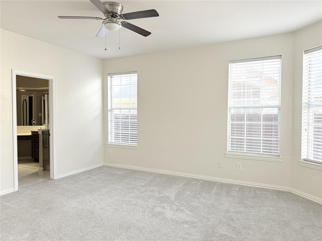 119 Parkhurst Lane Allen, TX 75013 - Photo 10 of 24 a view of an empty room with a window