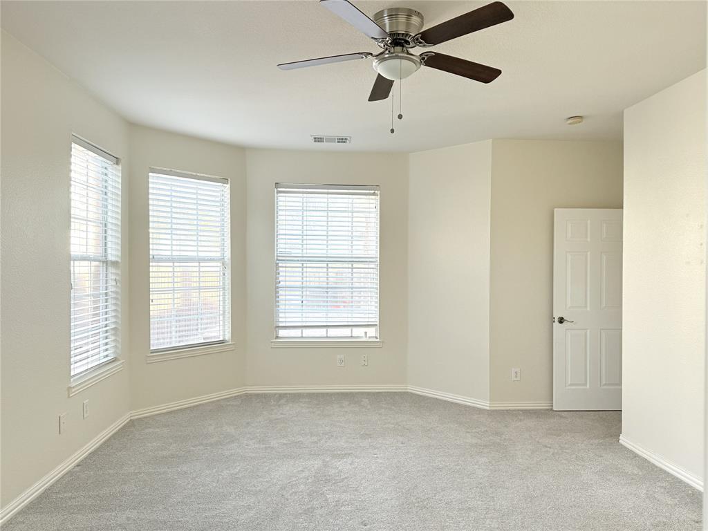119 Parkhurst Lane Allen, TX 75013 - Photo 12 of 24 a view of an empty room with a window