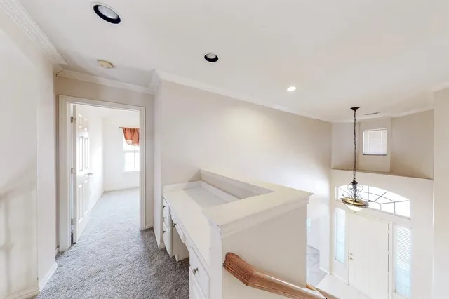a bathroom with a granite countertop sink a toilet and shower