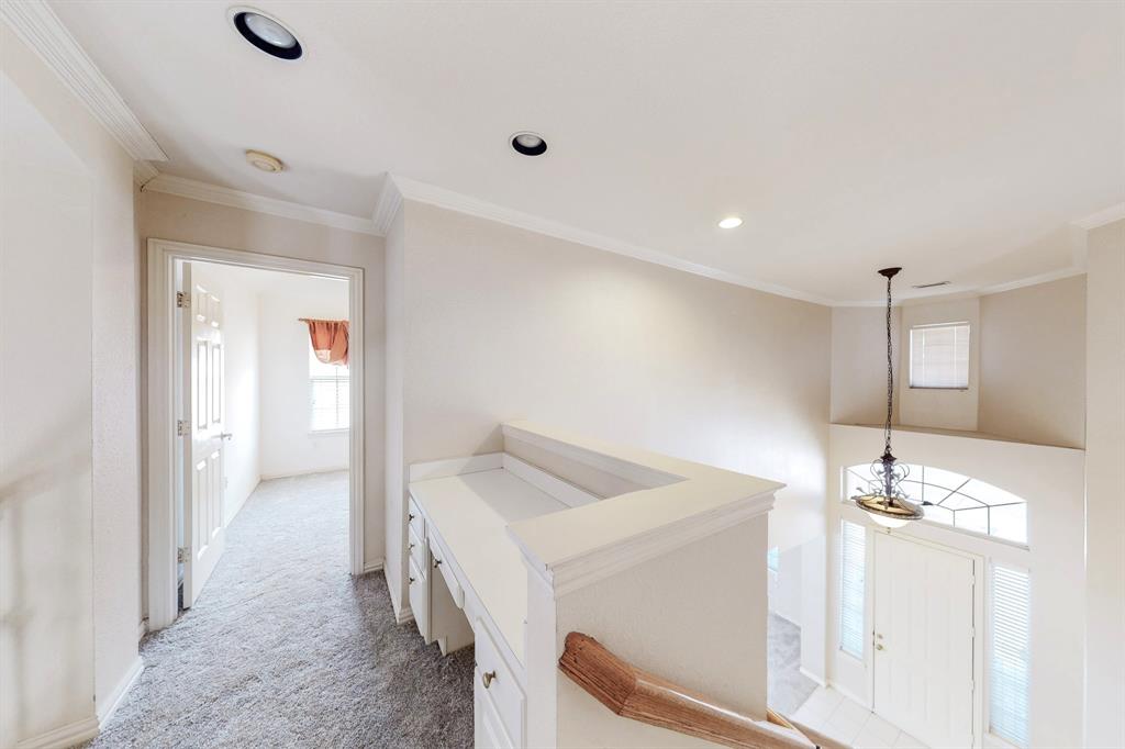 119 Parkhurst Lane Allen, TX 75013 - Photo 16 of 24 a room with a sink and chandelier