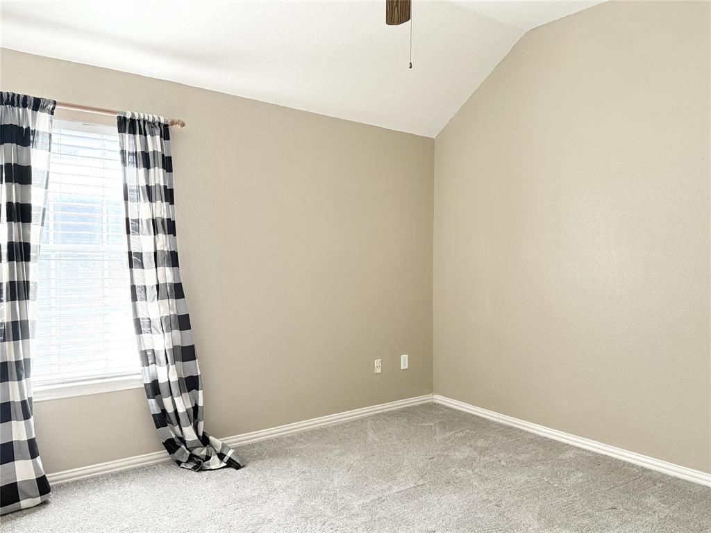 119 Parkhurst Lane Allen, TX 75013 - Photo 18 of 24 a view of an empty room with a window