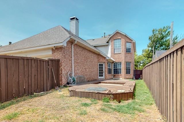 119 Parkhurst Lane Allen, TX 75013 - Photo 22 of 24 a front view of a house with a yard