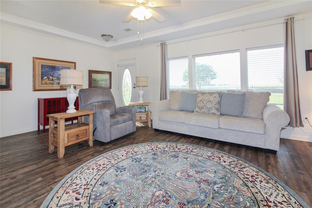 455 Hughes Cemetery Road Italy, TX 76651 - Photo 6 of 40 a living room with furniture and a large window