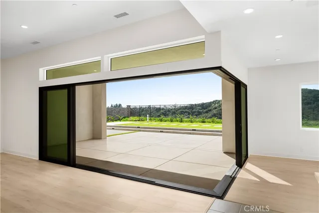 a view of an empty room with empty racks