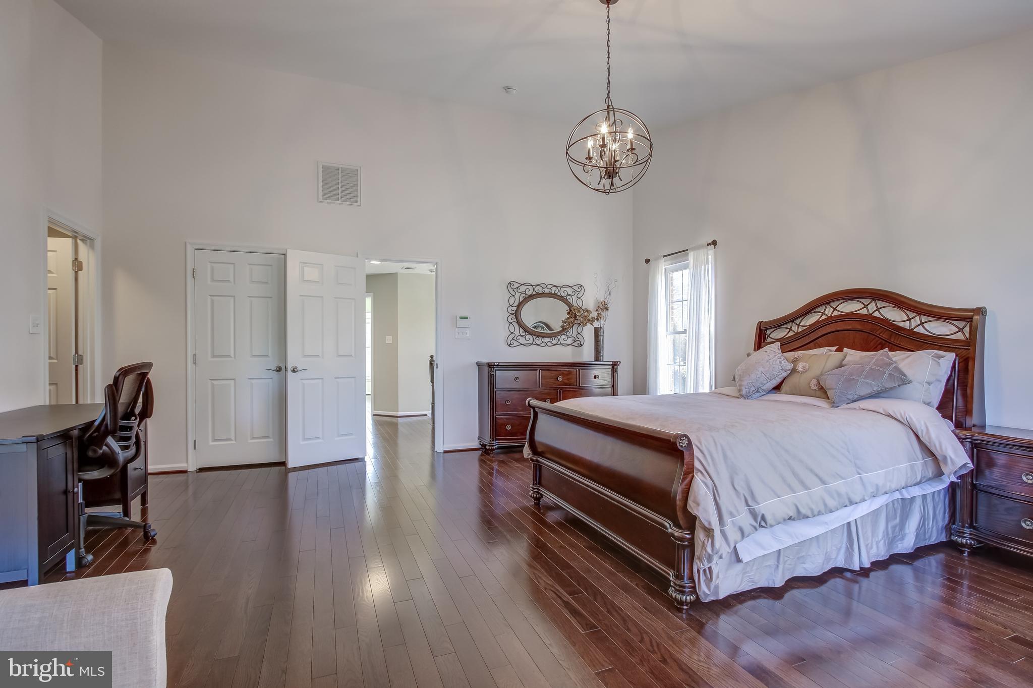 8445 Bells Ridge Terrace Potomac, MD 20854 - Photo 19 of 30 Master Bedroom With En-Suite