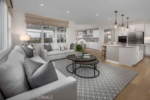 a living room with furniture and a table