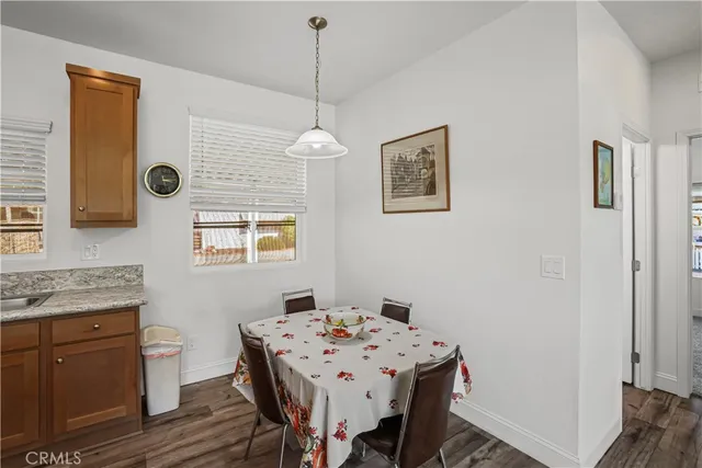 a kitchen with a sink stove and refrigerator