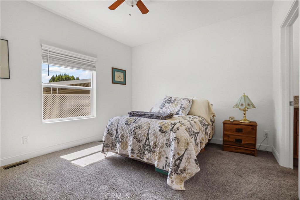 1700 South State Street, Unit 19 Hemet, CA 92543 - Photo 19 of 34 a bed sitting in a bedroom next to a window