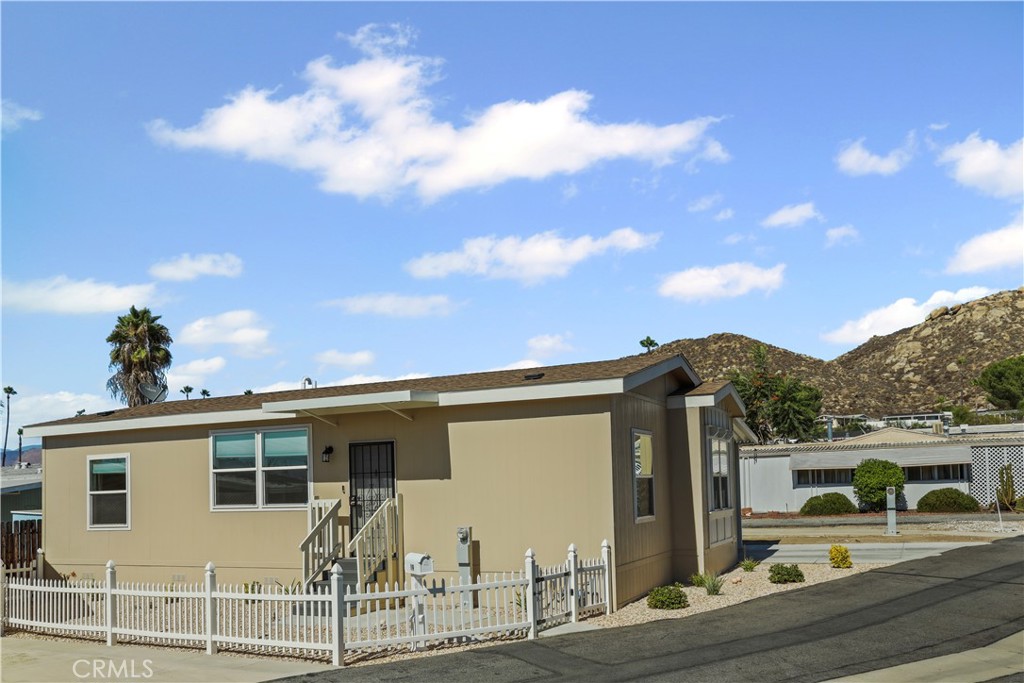 1700 South State Street, Unit 19 Hemet, CA 92543 - Photo 2 of 34 a view of a house with a patio