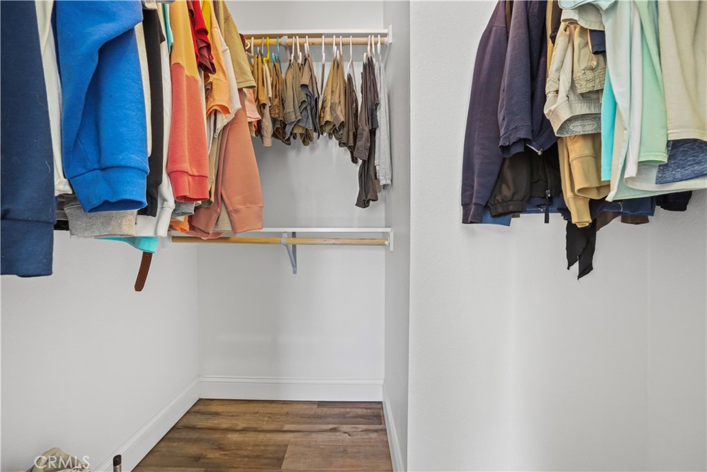 1700 South State Street, Unit 19 Hemet, CA 92543 - Photo 24 of 34 a view of walk in closet with clothes