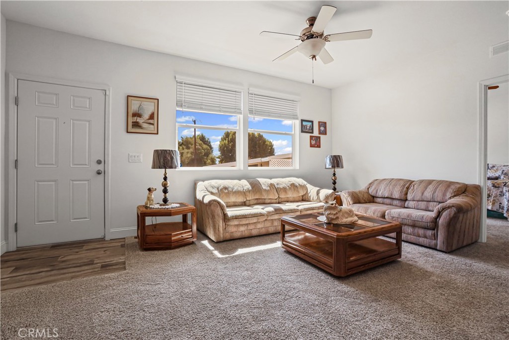 1700 South State Street, Unit 19 Hemet, CA 92543 - Photo 8 of 34 a living room with furniture and a ceiling fan