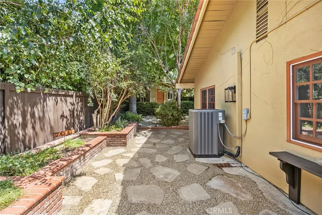 a living room with a couch and a window