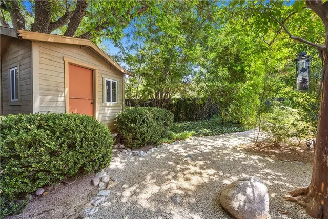 a backyard of a house with lots of green space