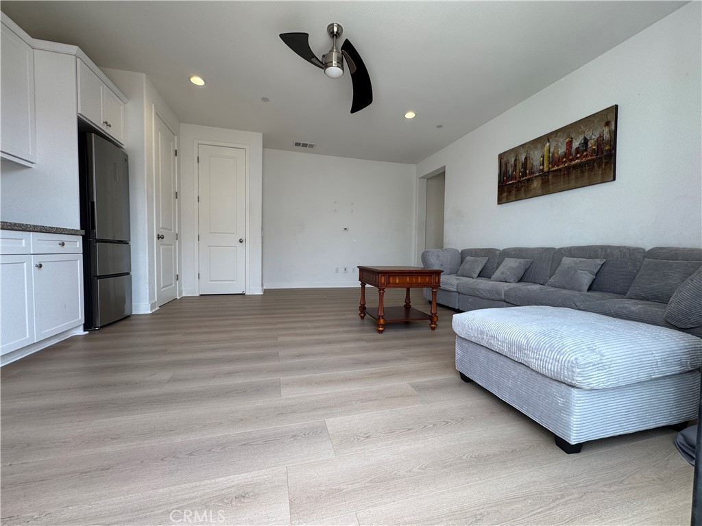 13562 Pointer Court Riverside, CA 92503 - Photo 11 of 42 a living room with furniture and a ceiling fan