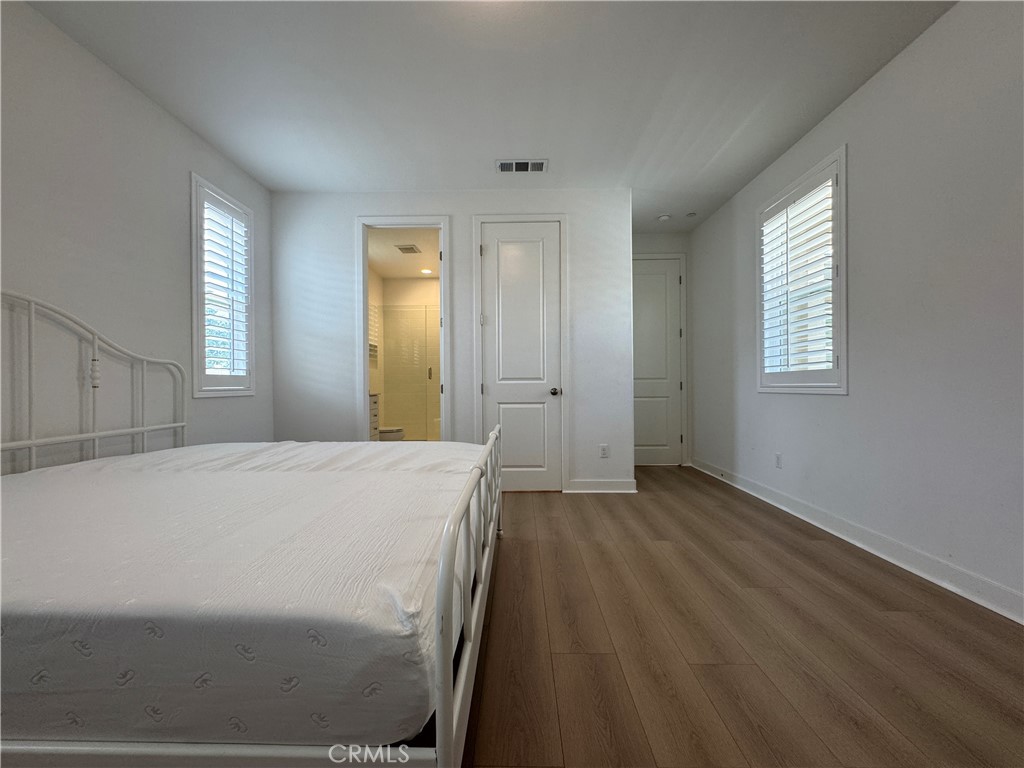 13562 Pointer Court Riverside, CA 92503 - Photo 18 of 42 a view of a room with wooden floor and window