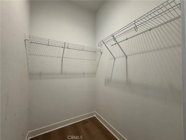 a view of a room with racks on the wall