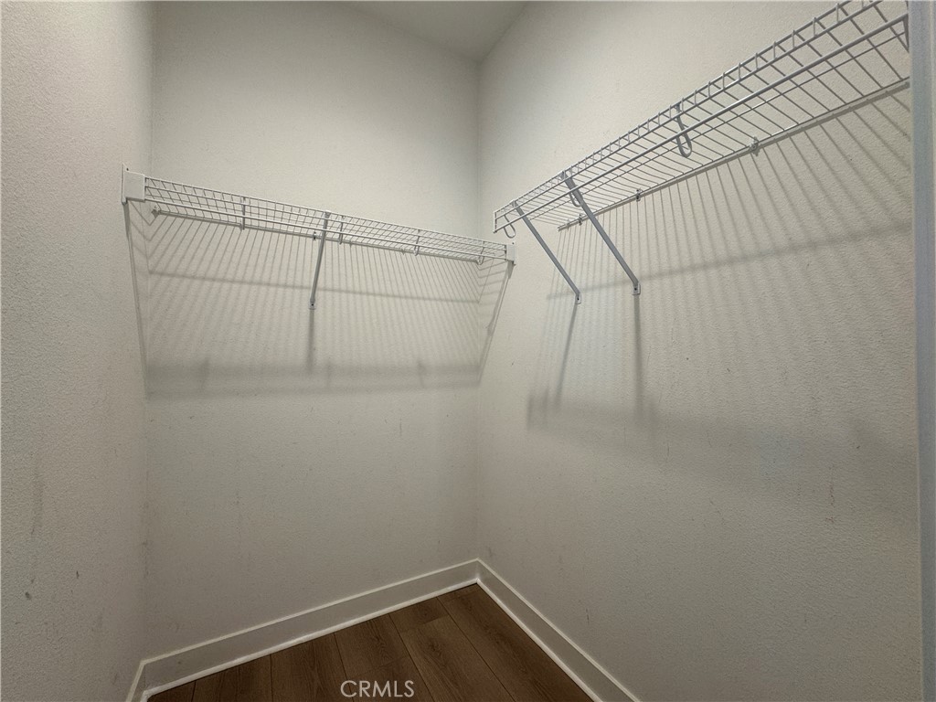 13562 Pointer Court Riverside, CA 92503 - Photo 20 of 42 a view of a room with racks on the wall