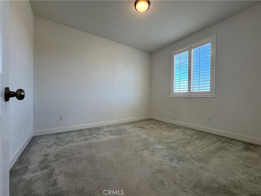 13562 Pointer Court Riverside, CA 92503 - Photo 27 of 42 an empty room with a window