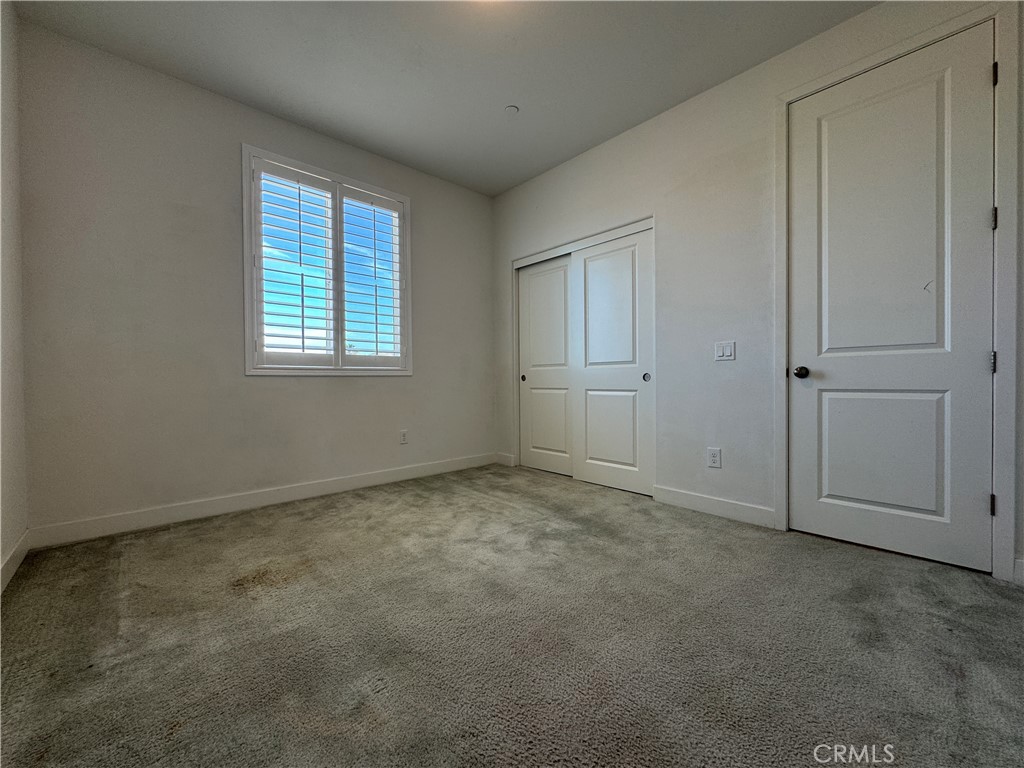 13562 Pointer Court Riverside, CA 92503 - Photo 29 of 42 an empty room with windows