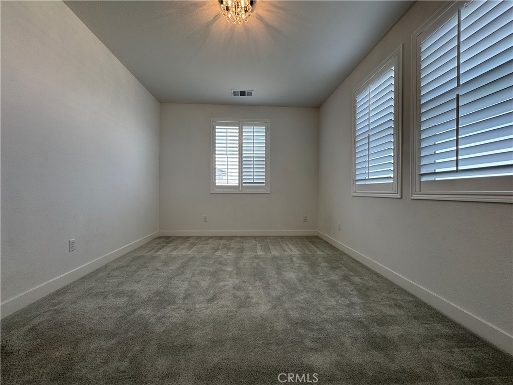 13562 Pointer Court Riverside, CA 92503 - Photo 41 of 42 an empty room with a window