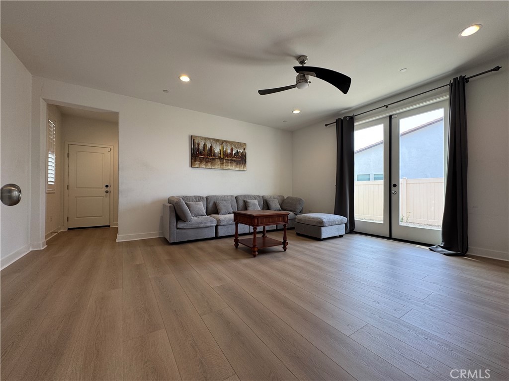 13562 Pointer Court Riverside, CA 92503 - Photo 9 of 42 a living room with furniture and a large window