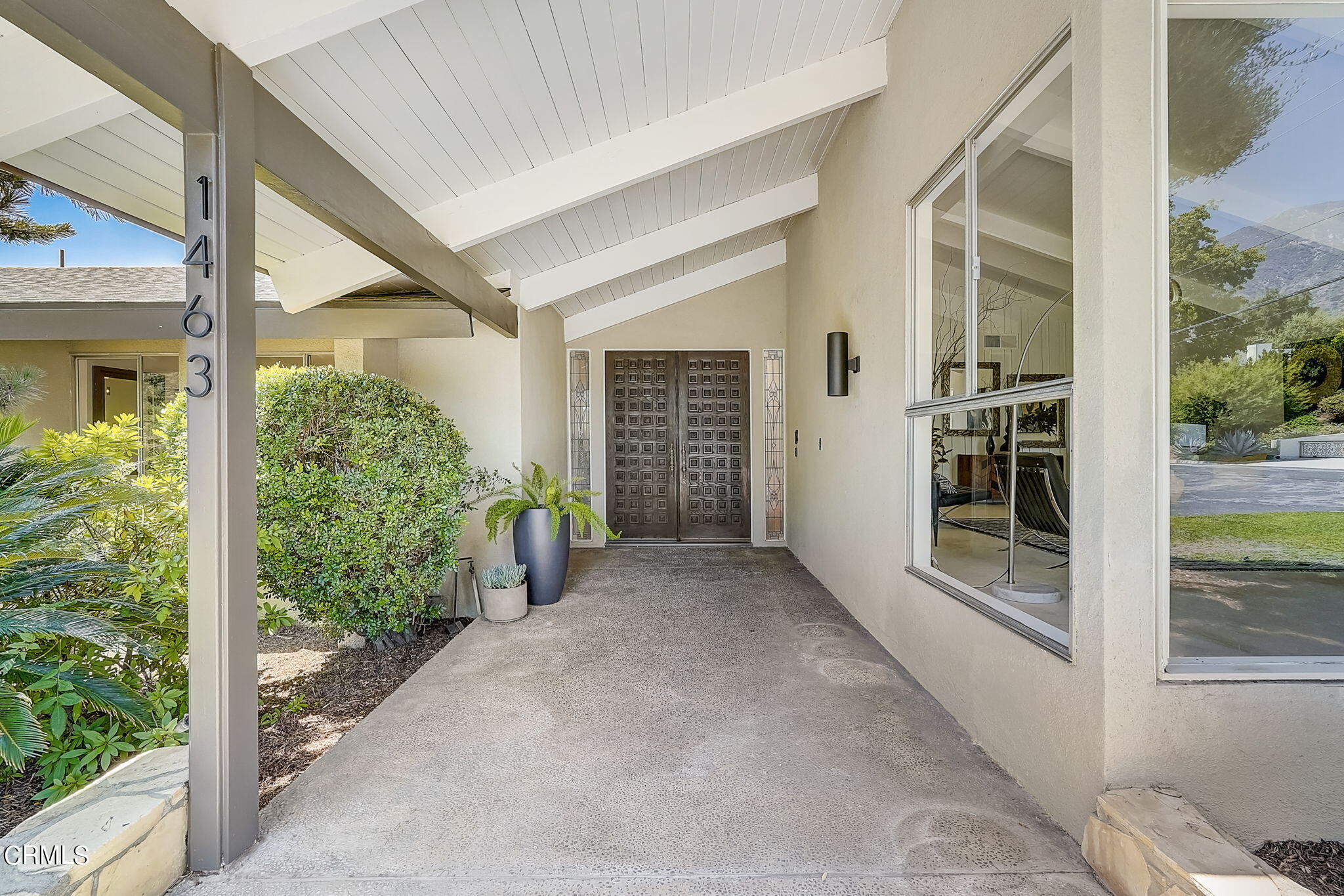 1463 Edgecliff Lane Pasadena, CA 91107 - Photo 2 of 5 a view of a house with a yard and potted plants