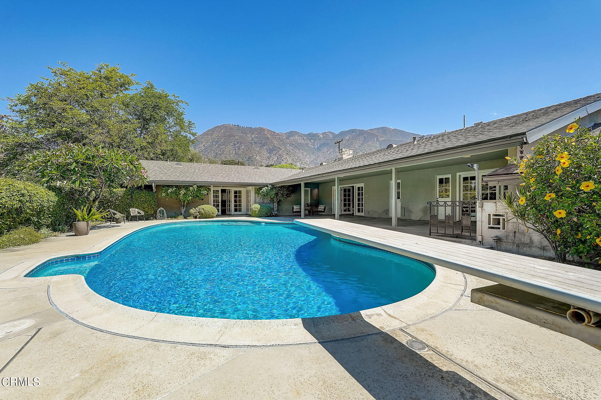 1463 Edgecliff Lane Pasadena, CA 91107 - Photo 3 of 5 a view of house with swimming pool outdoor seating