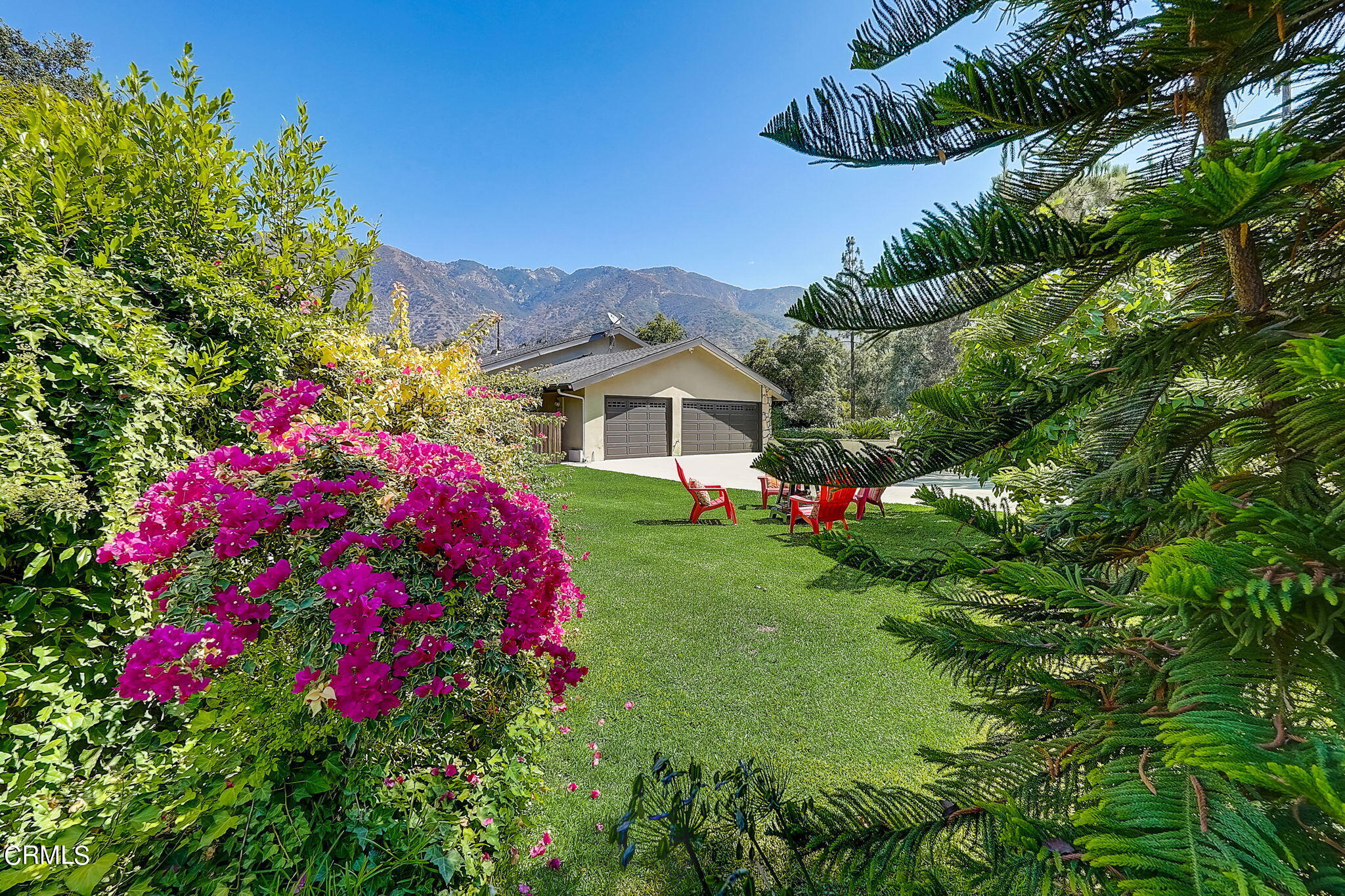 1463 Edgecliff Lane Pasadena, CA 91107 - Photo 4 of 5 a view of a house with a yard and garden