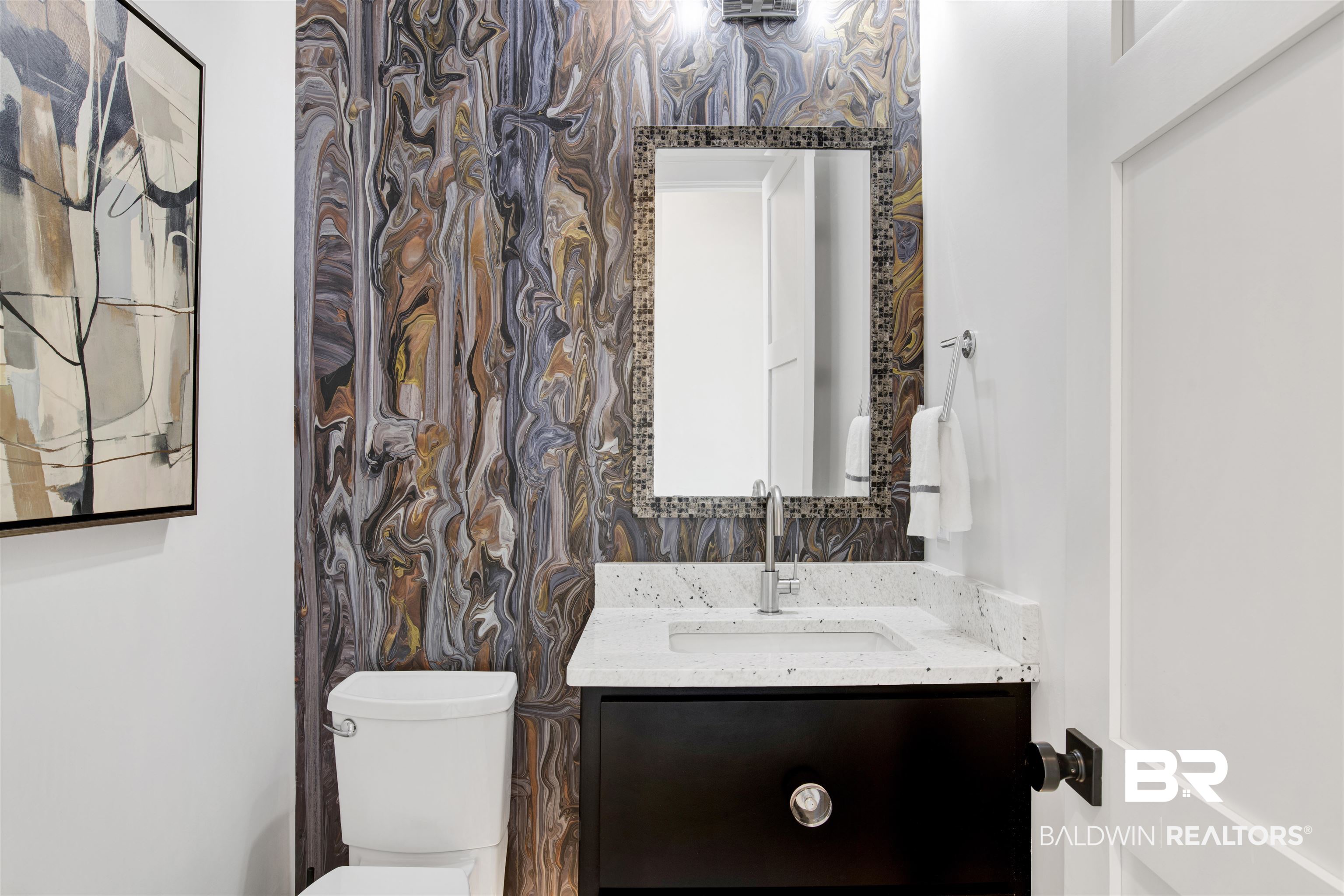 30239 Canal Court Orange Beach, AL 36561 - Photo 25 of 70 Half bathroom featuring vanity and wallpapered walls