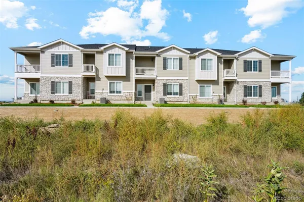 a front view of a house with a swimming pool