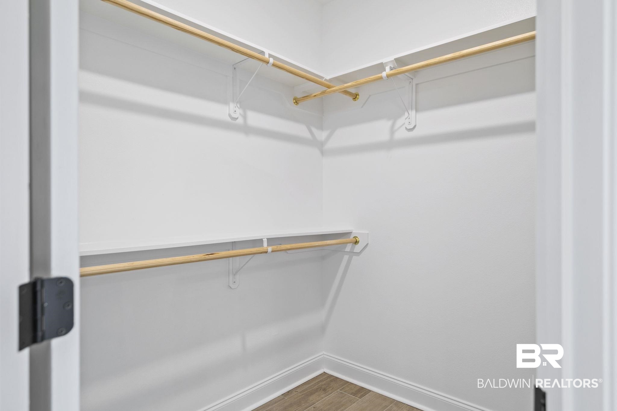10140 Chipper Lane Foley, AL 36535 - Photo 33 of 72 Spacious closet with wood-type flooring
