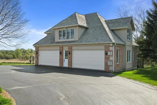 $2,349,999 | N84W36411 Riverwood Lane, Oconomowoc, WI 53066