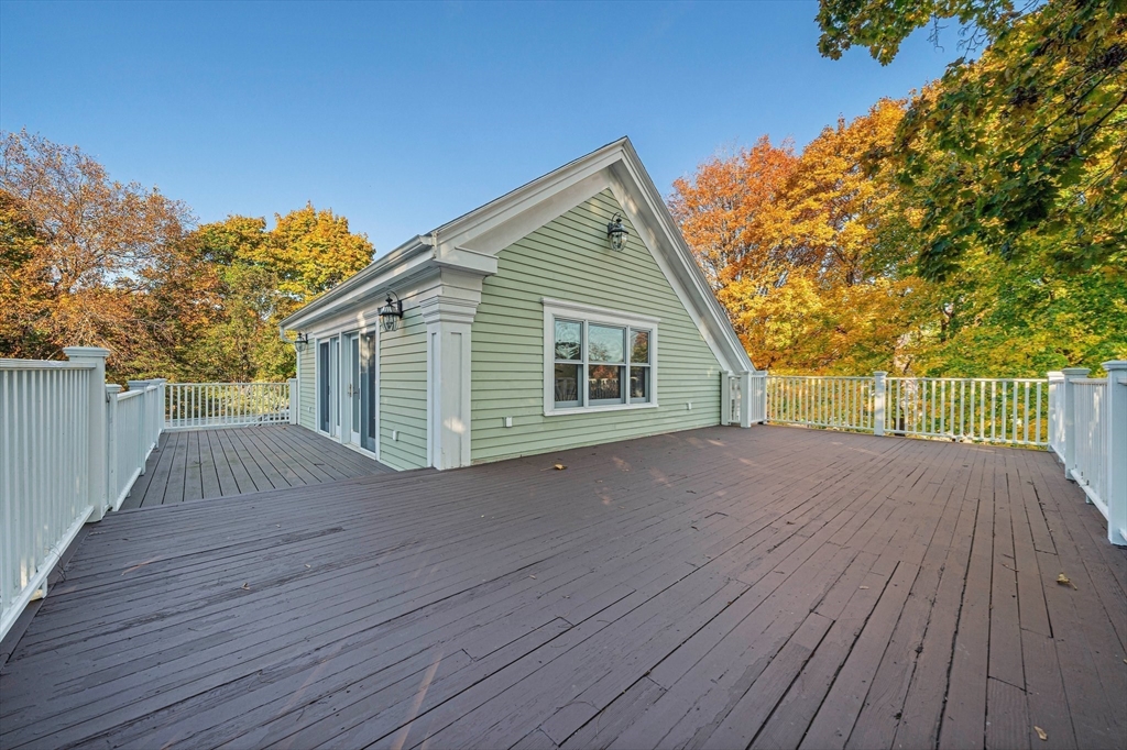 1032 Washington Street Canton, MA 02021 - Photo 24 of 42 a view of a house with a wooden deck