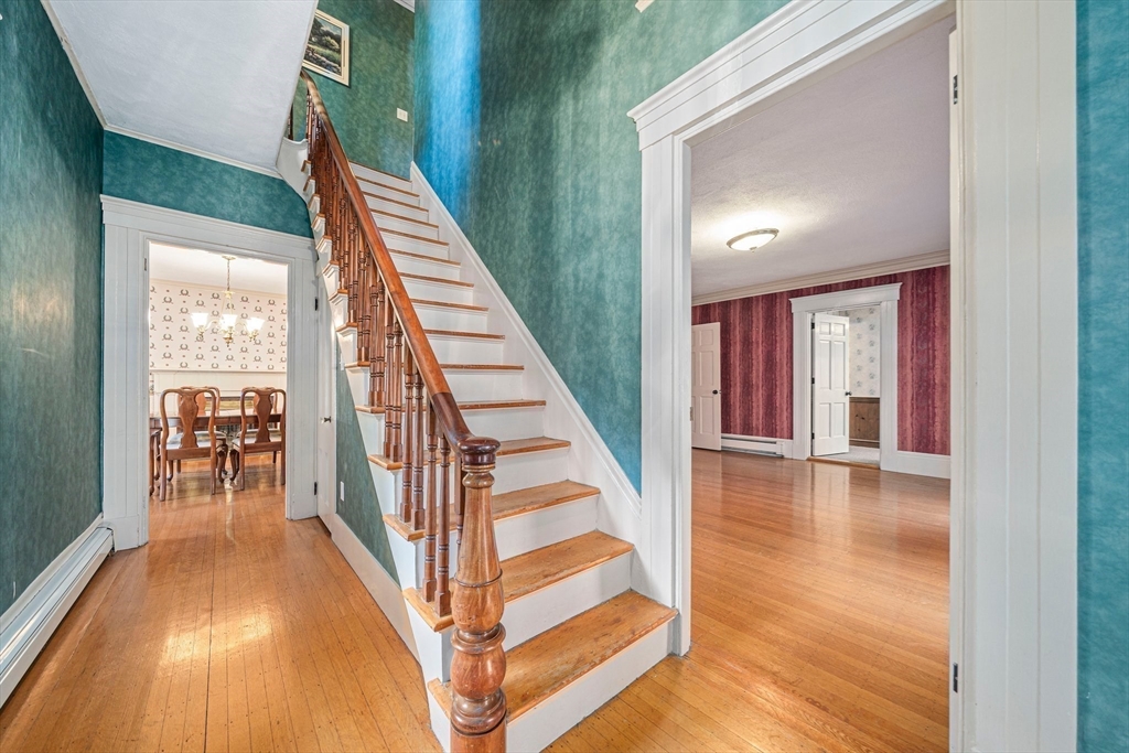 1032 Washington Street Canton, MA 02021 - Photo 25 of 42 a view of entryway and hall with wooden floor