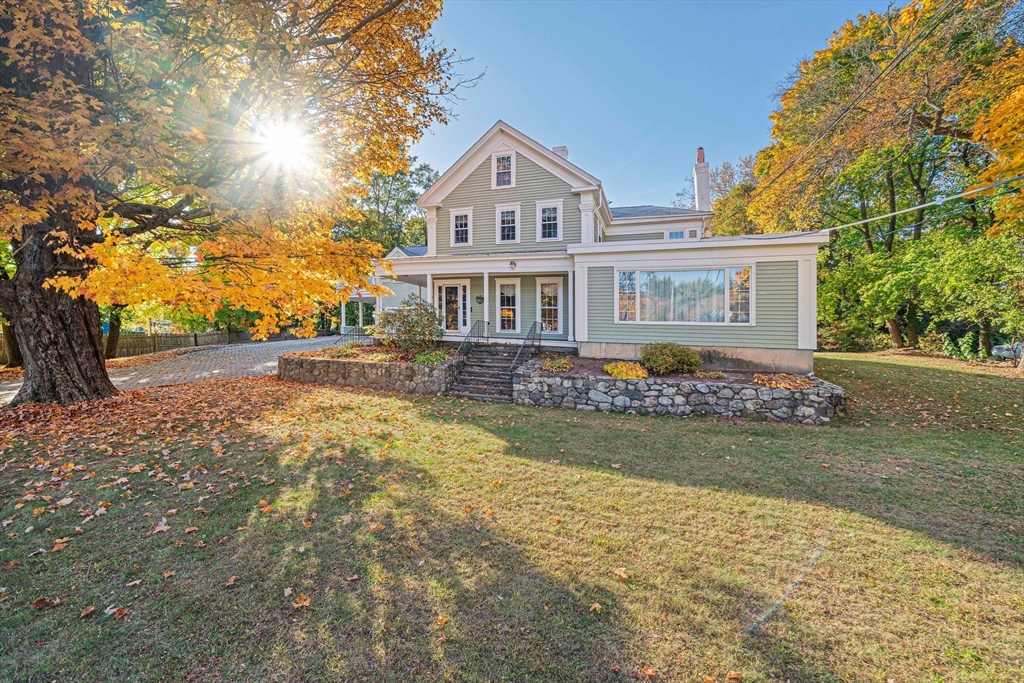 1032 Washington Street Canton, MA 02021 - Photo 3 of 42 front view of a house with a yard