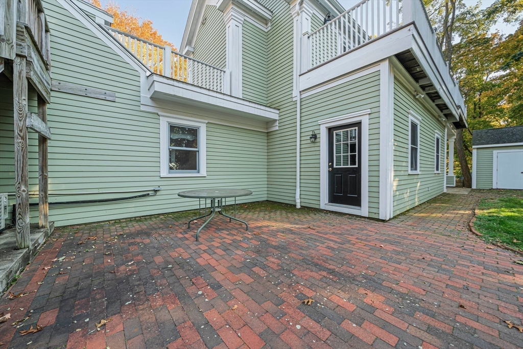 1032 Washington Street Canton, MA 02021 - Photo 35 of 42 a view of a house with a yard and wooden floor and fence