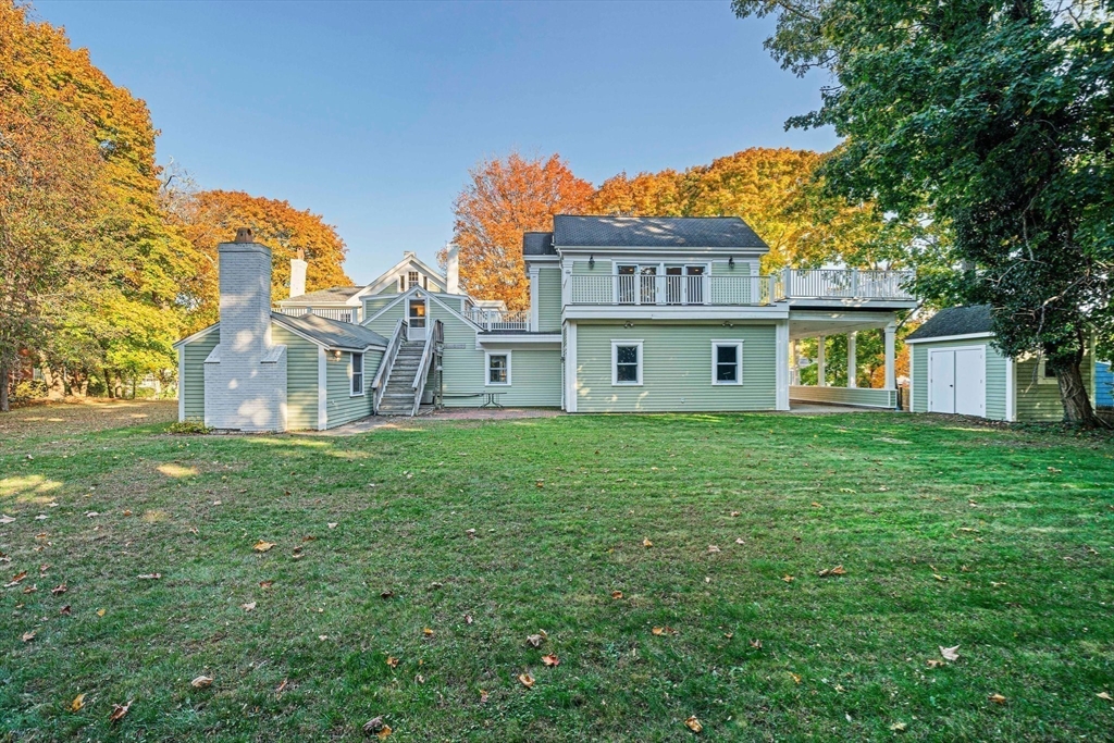 1032 Washington Street Canton, MA 02021 - Photo 36 of 42 a view of a house with a yard