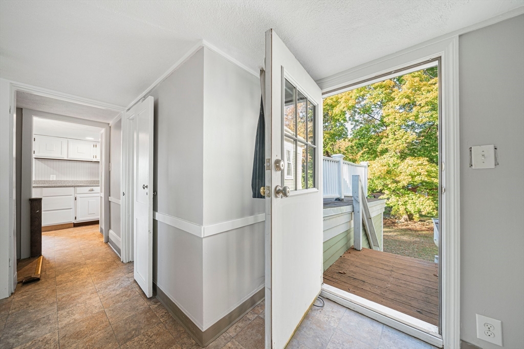 1032 Washington Street Canton, MA 02021 - Photo 39 of 42 a view of entryway and hall with wooden floor