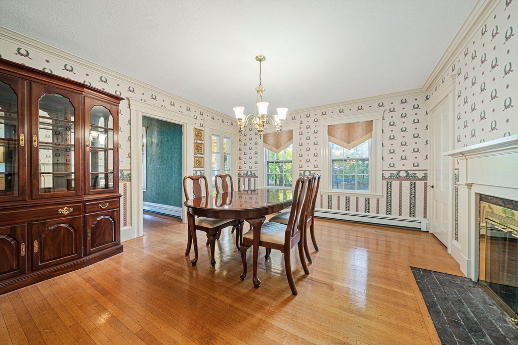 1032 Washington Street Canton, MA 02021 - Photo 8 of 42 a view of a dining room with furniture window and wooden floor