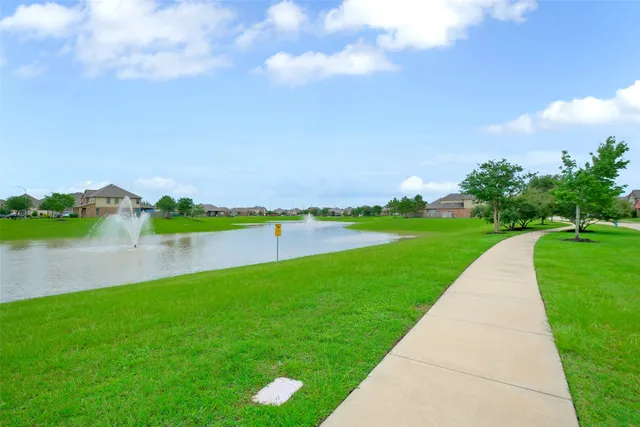 a view of lake with green space